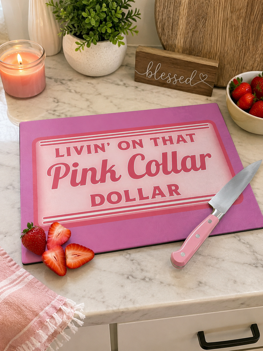 living on that pink collar dollar glass cutting board